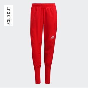 Red adidas pants